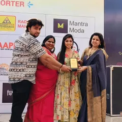 On stage receiving the 'Bhartiya Laadli Gaurav Award'. It is moments like these that motivate me to continue spreading love and music. I am so grateful for the recognition.