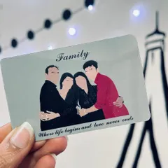 A custom wallet card featuring a faceless illustration of a family, with the quote "Family, where life begins and love never ends." It's a small, meaningful keepsake to carry with you.