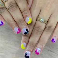 A playful explosion of color. This abstract design features a sheer base with organic shapes in purple, pink, yellow, and black for a unique and artistic look.