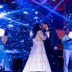 Under a sky of stars, we create the perfect setting for your love story to shine. This couple's performance was a highlight, complete with backup dancers and celestial-themed stage effects.
