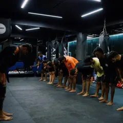 Respect is the foundation of everything we do. The class bows to the coach, a tradition that reinforces discipline and acknowledges the teacher student relationship.