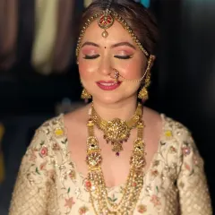 That serene bridal glow, captured just before she begins her new chapter. This close-up shows my signature 'filterless beauty' approach. I focused on creating luminous skin, soft pink eyeshadow, and perfectly defined features that look flawless both in person and on camera.