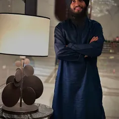 A portrait taken during a concert tour in Gujarat. Even when I am by a lamp, I try to be the brightest in the room with my positivity.