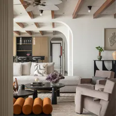 I fall madly in love with each project, and it shows in the outcome. This angle captures the harmonious arrangement of furniture and the beautiful contrast between the dark, sculptural coffee tables and the light, airy room.