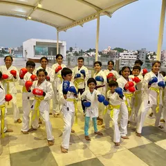 Hajime! Students from our PFC dojo are gloved up and ready for kumite practice, eager to apply their punching and kicking skills in sparring drills.