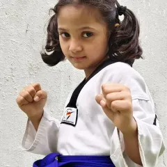 Zainab Shaikh, a true warrior. This portrait captures the focus and confidence of a district champion.
