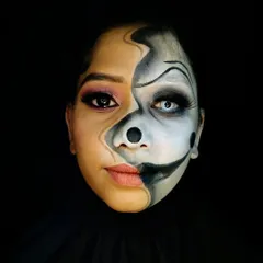 Another angle of the two-faced look, showing how the illusion holds from different perspectives. The use of white contact lenses adds a final, unsettling touch to the character side.
