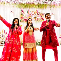 A moment of fun on stage with my co-singers. Our chemistry and energy translate into a great performance for the audience.