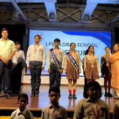Our new Head Boy and Head Girl stand proudly with the school leadership. We are committed to nurturing leaders who will uphold the values of our institution.