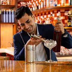 Varun in his element, measuring and mixing with precision. His passion for creating unique flavour combinations is at the heart of our bar program.