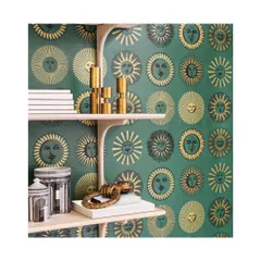 This 'Soli' wallpaper, with its radiant golden suns against a rich emerald green, is a perfect example of how a repetitive graphic motif can turn a wall into a captivating feature. It's an excellent choice for adding a touch of vintage glamour.