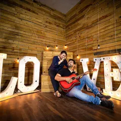 A fun and relaxed pre-wedding shoot in a studio setting. We offer versatile pre-wedding photography sessions, helping you get comfortable in front of the camera while capturing your personality as a couple before the big day celebrations begin.