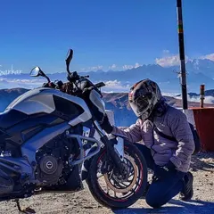A moment of connection between man and machine at the Kanchenjunga View Point in Nathang Valley, Sikkim. Our expeditions take you to some of the most remote and beautiful places in the Himalayas.