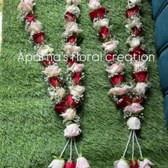 You can never go wrong with a classic. Here is a pair of fresh wedding varmalas I made, combining deep red and soft pink roses with tiny white flowers for a timeless and romantic look.