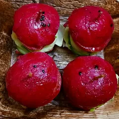 Adorable and healthy beetroot sliders. The vibrant pink buns are made from millet and beetroot, filled with a mini aloo tikki patty and crisp lettuce. They are a huge hit at parties and with kids.