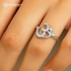 Wear your peace with our handcrafted 925 sterling silver Om ring. The sacred symbol is delicately studded with high-grade Zirconia, making it a sparkling daily reminder of balance and inner strength.
