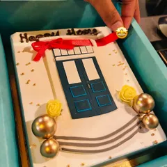 A "Happy Home" cake to celebrate a housewarming, designed to look like the front door of a new home.