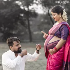 A playful interaction between the couple during a traditional saree maternity shoot. I believe in capturing the fun and laughter that is part of your unique story.