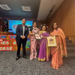 Receiving a token of appreciation after serving as a judge at the St. Xavier's school competition. It's always a pleasure to collaborate with educational institutions that prioritize holistic development.