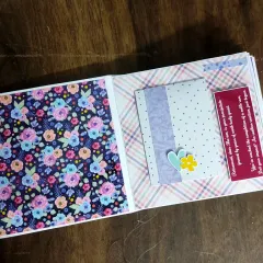 A page with a heartfelt retirement message and pretty floral patterns.