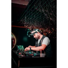 Focused on the mix. Every event requires my full attention to detail, from track selection to seamless transitions, ensuring the energy on the dance floor never drops.