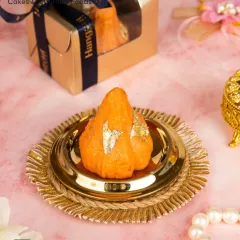 My Orange Mava Modaks are made with rich mawa and pure ingredients. Topped with edible gold foil, they are a delightful and traditional choice for prasad and gifting during Ganesh Chaturthi.