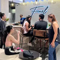 Our community gathering at the Fuel cafe after a tough session. It's the perfect spot to relax, chat, and refuel.