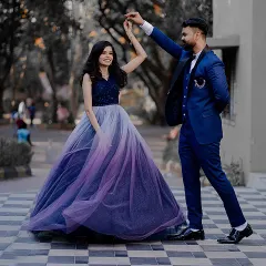 Pratik and Piyusha share a dance during their engagement ceremony. Her beautiful ombre gown and his sharp blue suit make for a stunning and dynamic photograph.
