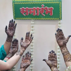 The whole squad with their hands up. This is what a 'Mehendi Samarambh' looks like when everyone joins in on the celebration.