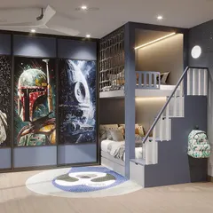 Transform your little one’s space into a superhero haven. This blue-themed room is perfect for adventure, featuring Star Wars posters on the wardrobe, a custom bunk bed, and a dedicated study area.