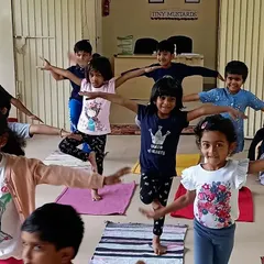 Our little yogis finding their balance during a kids' yoga session. I incorporate mindful movement to help children develop focus, coordination, and a positive connection with their bodies in a playful group setting.