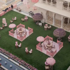 An aerial view of our 'Pink Jaipuri Bagh' mehendi at the Anantara Jaipur, where the decor's color palette and motifs were inspired by the Pink City itself.