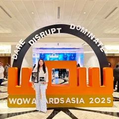 Posing with my award at the WOW Awards Asia 2025. The motto 'Dare, Disrupt, Dominate' perfectly captures the spirit of innovation I strive to bring to every project.