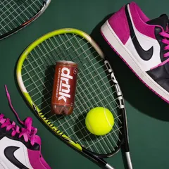 To give this chocolate drink an energetic and sporty vibe, I styled it with tennis rackets and sneakers. This conceptual approach connects the beverage to an active lifestyle, telling a story beyond just the flavor.