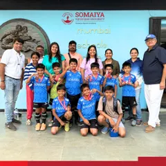 Our U-8 Division 1 football team proudly displays their bronze medals with coaches and parents after a successful MSSA Tournament campaign.