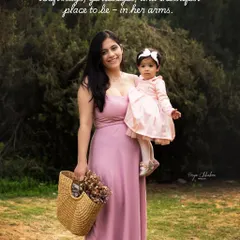 Soft hugs and gentle eyes in a beautiful outdoor setting. This mother and daughter moment was part of a first birthday celebration, capturing the special bond they share.