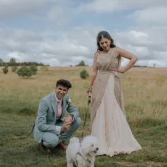 A fun and relaxed portrait of the couple with their adorable dog. This image shows our ability to capture natural and joyful moments during the couple's portrait session.