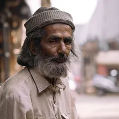 A poignant portrait of an old man with weathered features. This image, one of my favorites, represents my goal to find and share the stories etched in people's faces.