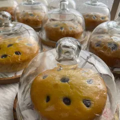 My lemon blueberry tea cakes are very popular as return favors. Here they are packed in individual glass cloches, which makes for a very elegant party gift.