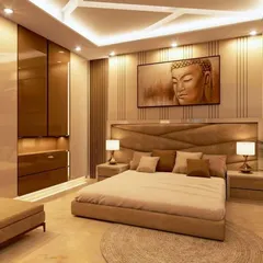 I designed this serene bedroom with a calming Buddha artwork above the bed. The warm, indirect lighting from the false ceiling and the paneled walls create a peaceful and meditative ambiance.