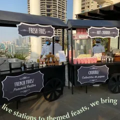 Live food carts are a fantastic addition to any outdoor event or kids' party. Here we have our fresh fries and hot churros stations, serving up delicious treats that guests of all ages love.