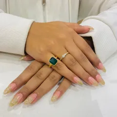 Gold glitter adds a touch of warmth and luxury. These long, elegant nail extensions feature a sparkling gold glitter fade at the tips, creating a glamorous and festive look perfect for celebrations.
