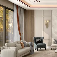 Natural light floods this living area, highlighting the soft, neutral tones of the custom sofa and wingback chair. The geometric patterns on the rug and ceiling add a layer of subtle complexity to the otherwise serene and comfortable setting.