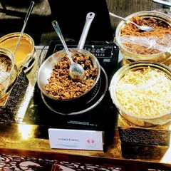 This is a live counter for Dryfruit Goond Bhel, a unique winter dessert. We mix edible gum (goond) with dry fruits, fresh khoya, and serve it warm with a jaggery and pistachio sauce.
