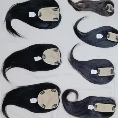 Here you can see the underside of my hair toppers, revealing the lightweight base and secure clips. I offer different base sizes to provide coverage exactly where it's needed.