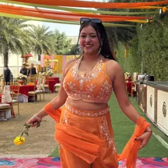My favorite season is wedding season, especially for a vibrant Haldi ceremony. Here I am, all set in my orange outfit, ready to bring the sunshine and energy to the party.