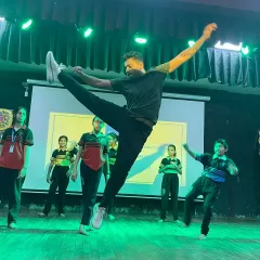 Dance is about expression and pushing your limits. As an instructor, I lead by example, showcasing the power and athleticism that dance builds during a workshop with students.