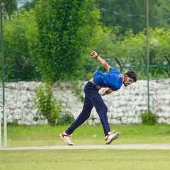 A fast bowler charging in with full commitment during an ODI match in Dehradun. Our tours test players' skills in different formats and conditions, building versatile and resilient cricketers.