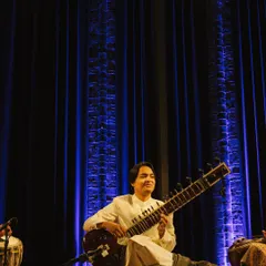 A wider view of the stage at Amstelkerk, Amsterdam, with the beautiful blue curtain backdrop. The energy from the audience in this historic venue was truly special.