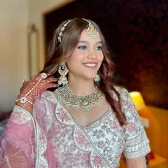 A flawless and stunning look for the sister of the bride. We went with a soft, rosy makeup look to complement her beautiful pink and white lehenga, making her look absolutely radiant.